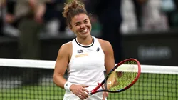 Jasmine Paolini of Italy celebrates winning match point against Emma Navarro of United States in the Ladies' Singles Quarter Final match during day nine of The Championships Wimbledon 2024.