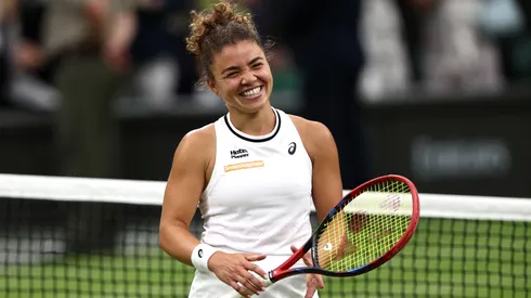 Jasmine Paolini of Italy celebrates winning match point against Emma Navarro of United States in the Ladies' Singles Quarter Final match during day nine of The Championships Wimbledon 2024.
