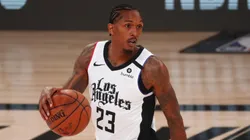 Lou Williams #23 of the LA Clippers controls the ball against the Denver Nuggets in the first quarter at AdventHealth Arena at ESPN Wide World Of Sports Complex on August 12, 2020 in Lake Buena Vista, Florida.