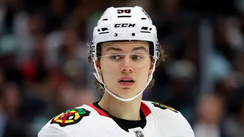 Connor Bedard #98 of the Chicago Blackhawks looks on during the first period against the Seattle Kraken at Climate Pledge Arena on December 14, 2023 in Seattle, Washington.