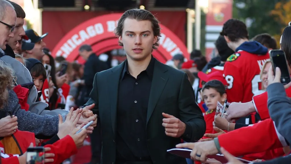 Connor Bedard #98 of the Chicago Blackhawks arrives to the red carpet prior to the Chicago Blackhawks home opener against the San Jose Sharks at the United Center on October 17, 2024 in Chicago, Illinois.