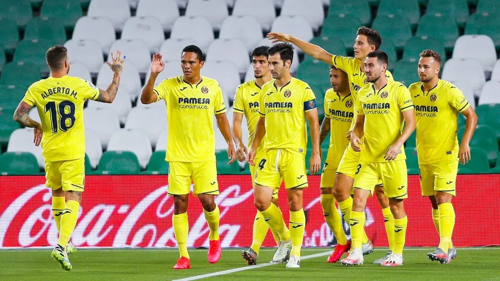Gerard Moreno of Villarreal CF celebrates with his team mate Moi Gomez of Villarreal CF after scoring his team’s first goal from the penalty spot during the Liga match in 2020. (Source: Fran Santiago/Getty Images)