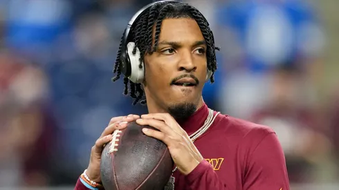 Jayden Daniels #5 of the Washington Commanders warms up prior to playing the Detroit Lions in the NFC Divisional Playoff at Ford Field on January 18, 2025 in Detroit, Michigan.