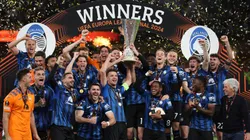 Berat Djimsiti of Atalanta BC lifts the UEFA Europa League Trophy with teammates after their team's victory during the UEFA Europa League 2023/24 final match againts Bayer 04 Leverkusen.