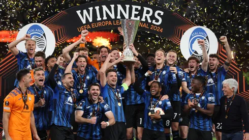 Berat Djimsiti of Atalanta BC lifts the UEFA Europa League Trophy with teammates after their team's victory during the UEFA Europa League 2023/24 final match againts Bayer 04 Leverkusen.