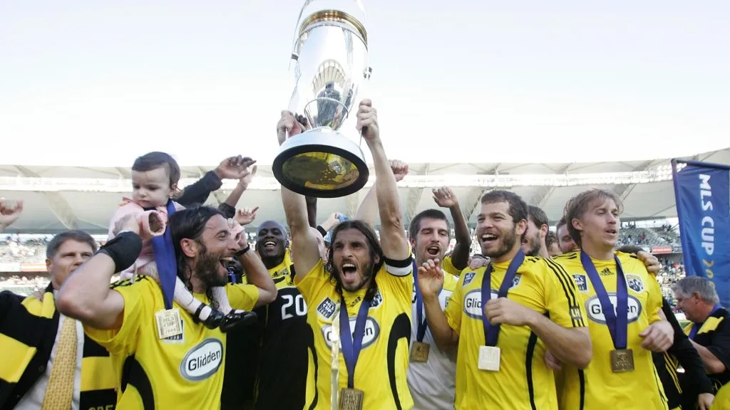 Gino Padula #4 of the Columbus Crew hoists the MLS Cup after defeating the New York Red Bulls at the Home Depot Center during the 2008 MLS Cup. (Source: Mike Stobe/Getty Images for New York Red Bulls)