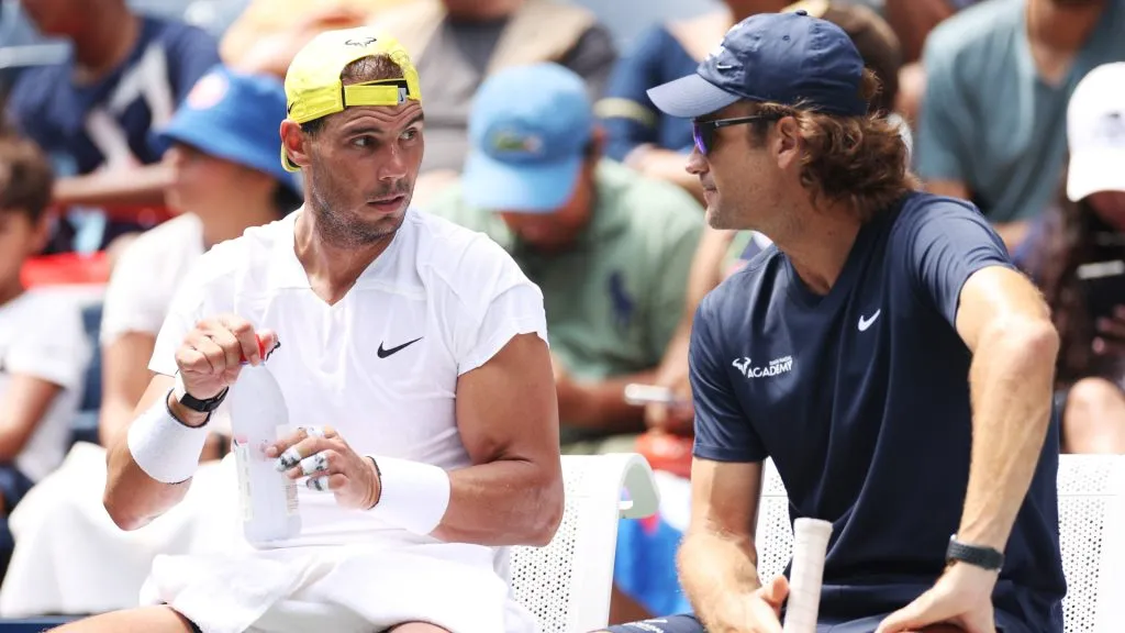 Rafael Nadal of Spain (L) talks with his coach Carlos Moya (R) during a practice session before the start of the 2022 US Open. (Sarah Stier/Getty Images)