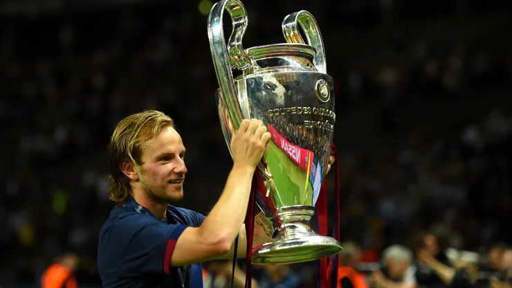 Ivan Rakitic of Barcelona holds the trophy as he celebrates victory after the UEFA Champions League Final between Juventus and FC Barcelona.