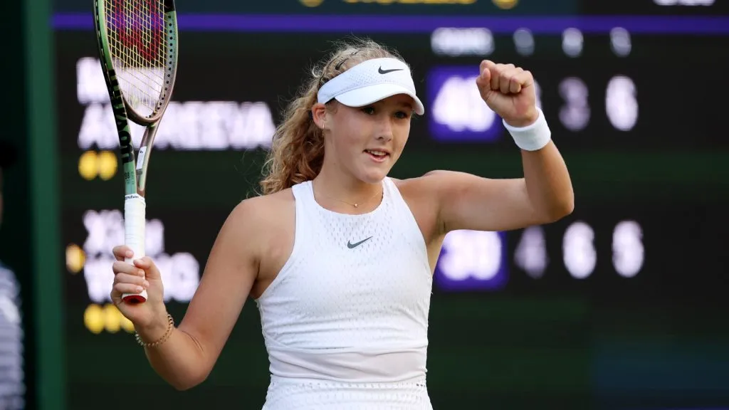 Mirra Andreeva celebrates winning match point against Xiyu Wang in the Women’s Singles first round match during day three of The Championships Wimbledon 2023. (Source: Clive Brunskill/Getty Images)