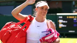Paula Badosa of Spain leaves the court after pulling out due to injury against Marta Kostyuk of Ukraine in the Women's Singles second round match during day five of The Championships Wimbledon 2023.