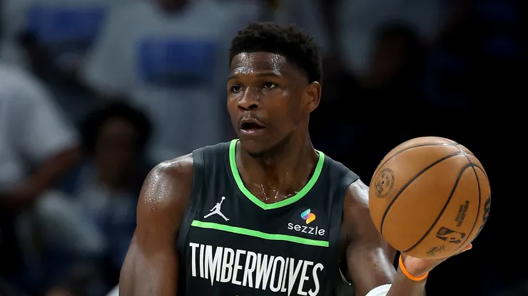 Anthony Edwards #5 of the Minnesota Timberwolves passes the ball against Cason Wallace #22 of the Oklahoma City Thunder during the first quarter in Game One of the Western Conference Finals of the 2025 NBA Playoffs