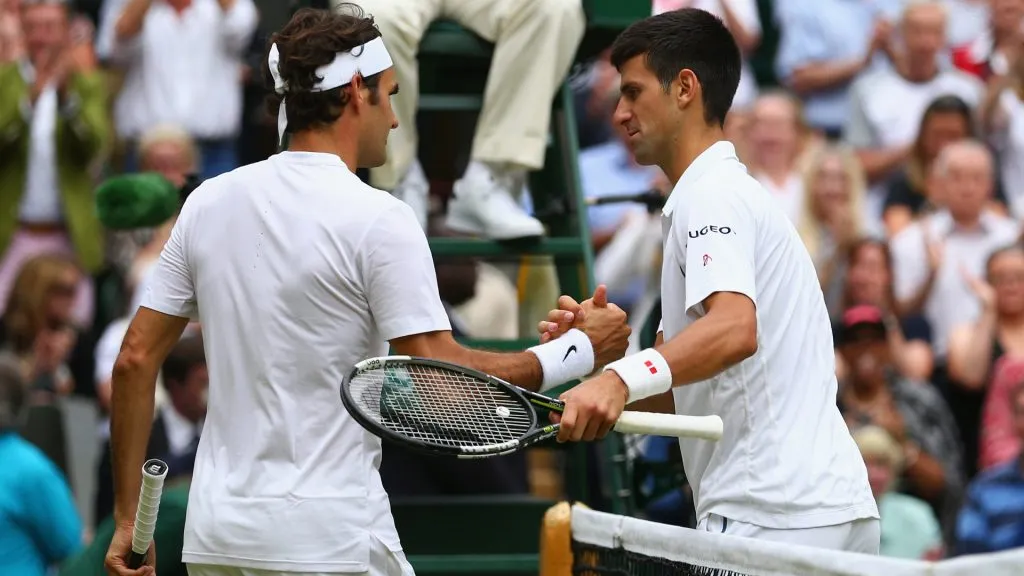 Novak Djokovic and Roger Federer during the 2015 Wimbledon. (Clive Brunskill/Getty Images)