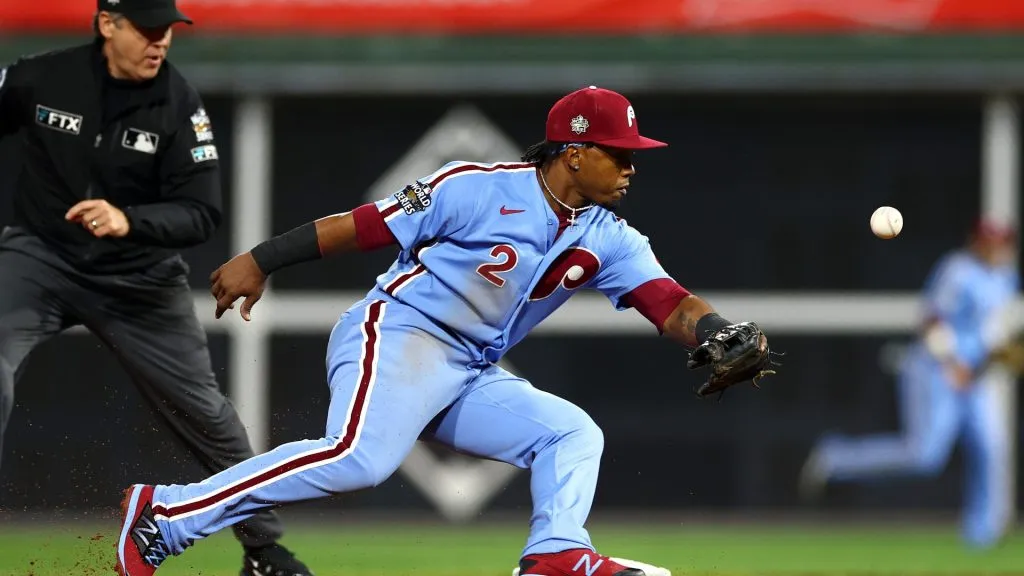 Jean Segura #2 of the Philadelphia Phillies attempts to field a ball hit by Alex Bregman #2 of the Houston Astros