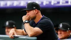 DENVER, CO - MAY 19: Interim Manager Warren Schaeffer #34 of the Colorado Rockies looks on from the bench in the first inning against the Philadelphia Phillies at Coors Field on May 19, 2025 in Denver, Colorado.