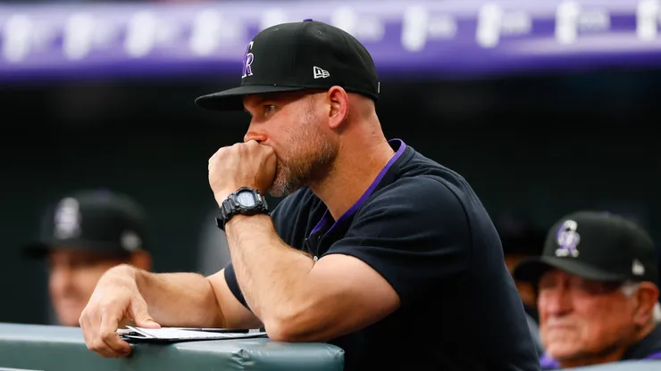 DENVER, CO - MAY 19: Interim Manager Warren Schaeffer #34 of the Colorado Rockies looks on from the bench in the first inning against the Philadelphia Phillies at Coors Field on May 19, 2025 in Denver, Colorado.