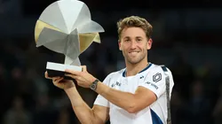 Casper Ruud of Norway celebrates with the trophy after his victory in the Men's Singles Final on Day Thirteen of the Mutua Madrid Open at La Caja Magica on May 04, 2025.