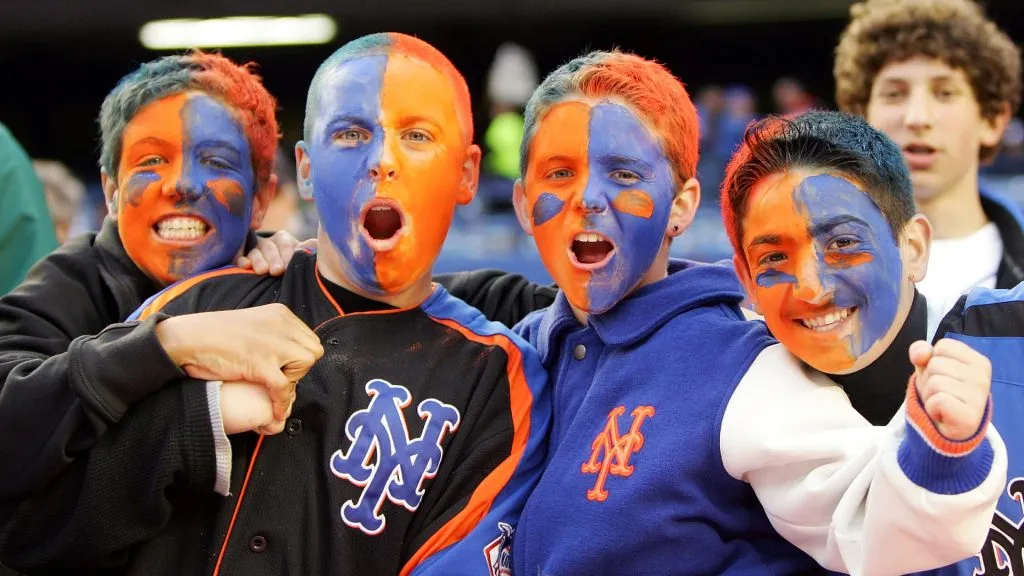 Young fans of the New York Mets pose before the Mets play the New York Yankees at Shea Stadium May 18, 2007. (Source: Jim McIsaac/Getty Images)