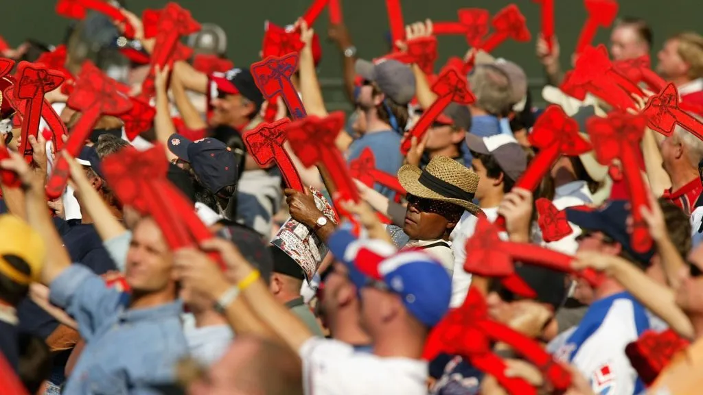 Fans of the Atlanta Braves do the Tomahawk Chop during their game against the Houston Astros in game one of the National League Divisional Series on October 6, 2004. (Source: Streeter Lecka/Getty Images)