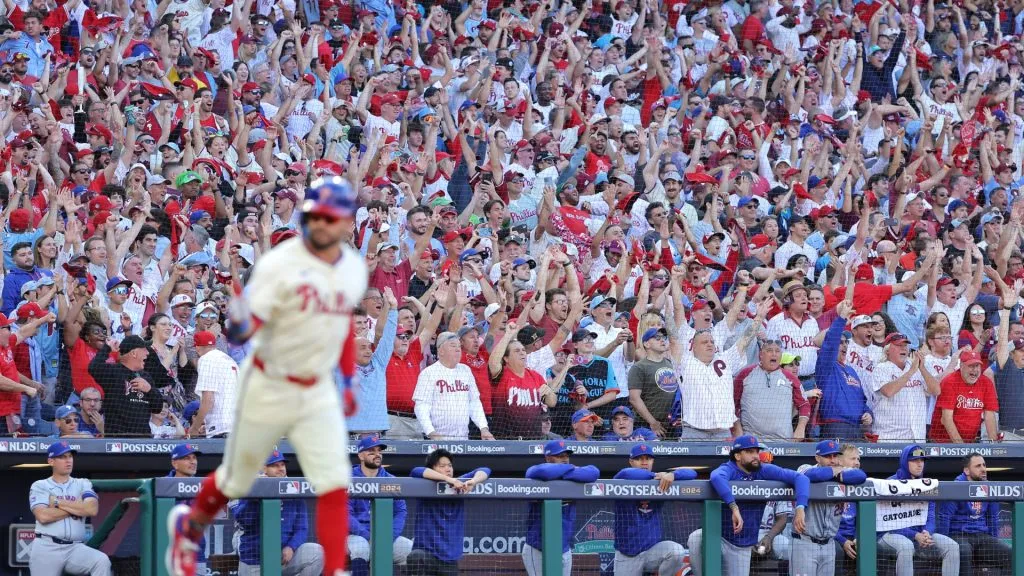 Fans celebrate a Kyle Schwarber #12 of the Philadelphia Phillies home run against the New York Mets during the first inning in Game One of the Division Series in 2024. (Source: Hunter Martin/Getty Images)