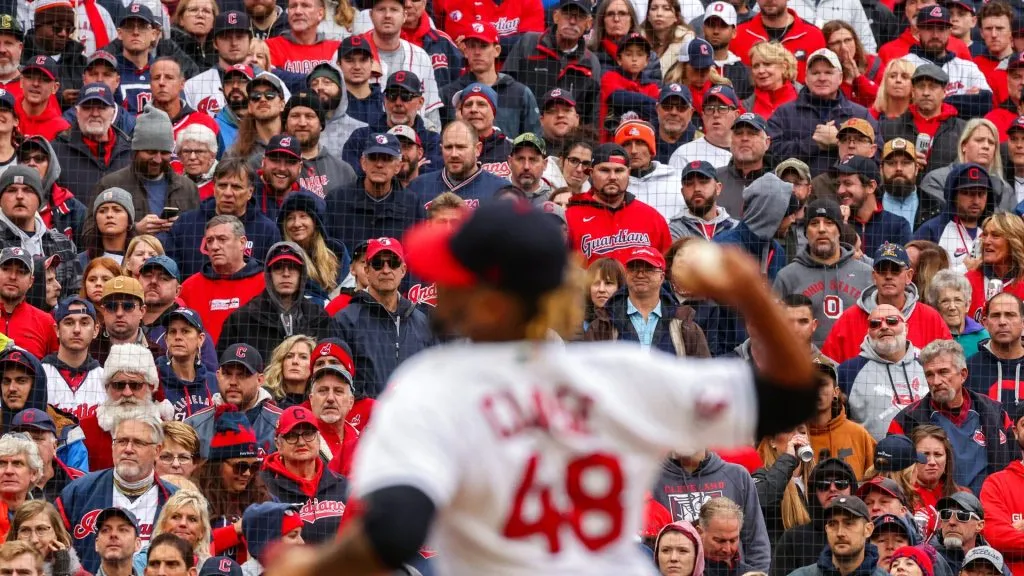 A fan dressed as Santa Claus looks on as Emmanuel Clase #48 of the Cleveland Guardians pitches against the the Tampa Bay Rays during Game One of the Wild Card Series in 2022. (Source: Patrick Smith/Getty Images)
