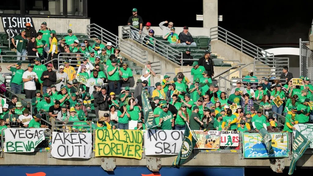 Oakland Athletics fans display signs during a reverse boycott game against the Tampa Bay Rays at RingCentral Coliseum on June 13, 2023. (Source: Brandon Vallance/Getty Images)