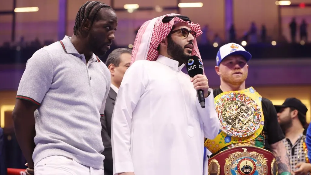 Terence Crawford, Turki Al-Sheikh and Saul “Canelo” Alvarez (L-R) after the super middleweight fight on the Fatal Fury City of Wolves card at ANB Arena on May 03, 2025 in Riyadh, Saudi Arabia. (Photo by Richard Pelham/Getty Images)