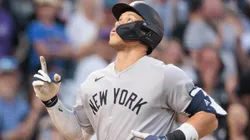 Aaron Judge #99 of the New York Yankees reacts after hitting a home run during the fifth inning against the Colorado Rockies at Coors Field on May 23, 2025 in Denver, Colorado.