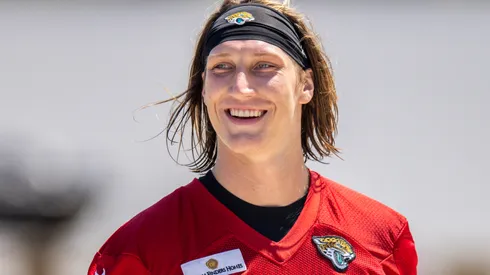 Trevor Lawrence #16 of the Jacksonville Jaguars looks on during Training Camp at TIAA Bank Field on July 30, 2021 in Jacksonville, Florida.