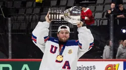 Jeremy Swayman #1 of team USA lifts the IIHF trophy after the 2025 Ice Hockey World Championship match between Switzerland and USA at Avicii Arena on May 25, 2025 in Stockholm, Sweden.