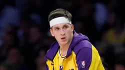 Austin Reaves #15 of the Los Angeles Lakers waits at the scorer's desk during a 103-96 loss to the Minnesota Timberwolves in Game Five of the Western Conference First Round NBA Playoffs