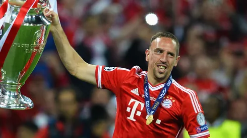 Franck Ribery of Bayern Muenchen celebrates with the trophy after victory in the UEFA Champions League final match between Borussia Dortmund and FC Bayern Muenchen