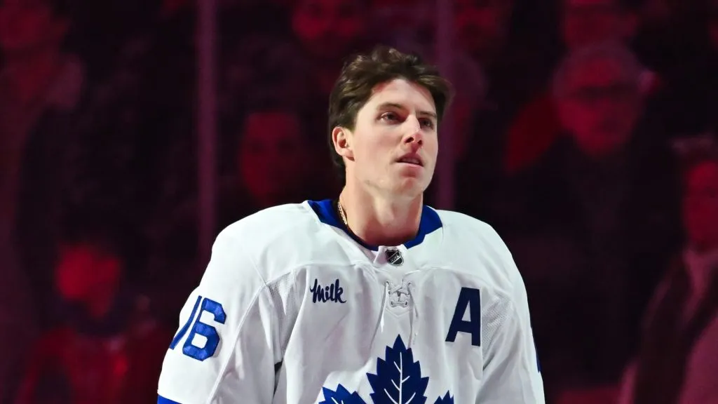 Mitch Marner #16 of the Toronto Maple Leafs stands during the anthem prior to the game against the Montreal Canadiens at the Bell Centre on January 18, 2025 in Montreal, Quebec, Canada.