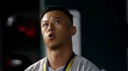 Rob Refsnyder #30 of the Boston Red Sox walks in the dugout after hitting a home run against the Texas Rangers at Globe Life Field on August 03, 2024 in Arlington, Texas.