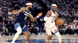 Shai Gilgeous-Alexander #2 of the Oklahoma City Thunder drives to the basket against Nickeil Alexander-Walker #9 of the Minnesota Timberwolves during the third quarter in Game Four of the Western Conference Finals of the 2025 NBA Playoffs