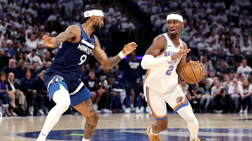 Shai Gilgeous-Alexander #2 of the Oklahoma City Thunder drives to the basket against Nickeil Alexander-Walker #9 of the Minnesota Timberwolves during the third quarter in Game Four of the Western Conference Finals of the 2025 NBA Playoffs
