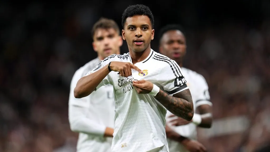 Rodrygo of Real Madrid celebrates scoring his team’s first goal during the UEFA Champions League 2024/25 Round of 16 first leg match against Atletico de Madrid on March 04, 2025. (Source: Aitor Alcalde/Getty Images)