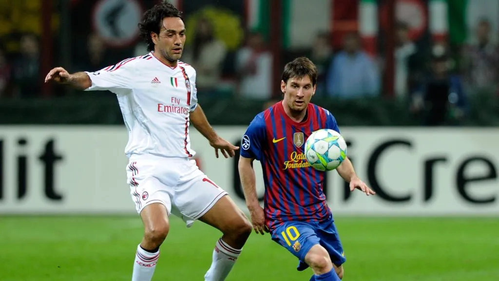 Alessandro Nesta of AC Milan and Lionel Messi of Barcelona compete for the ball during the 2012 UEFA Champions League. (Claudio Villa/Getty Images)