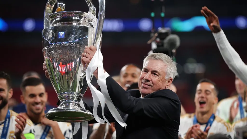 Carlo Ancelotti, Manager of Real Madrid celebrates with the trophy during the UEFA Champions League 2023/24 final match between Borussia Dortmund v Real Madrid CF. (Source: Alex Pantling/Getty Images)