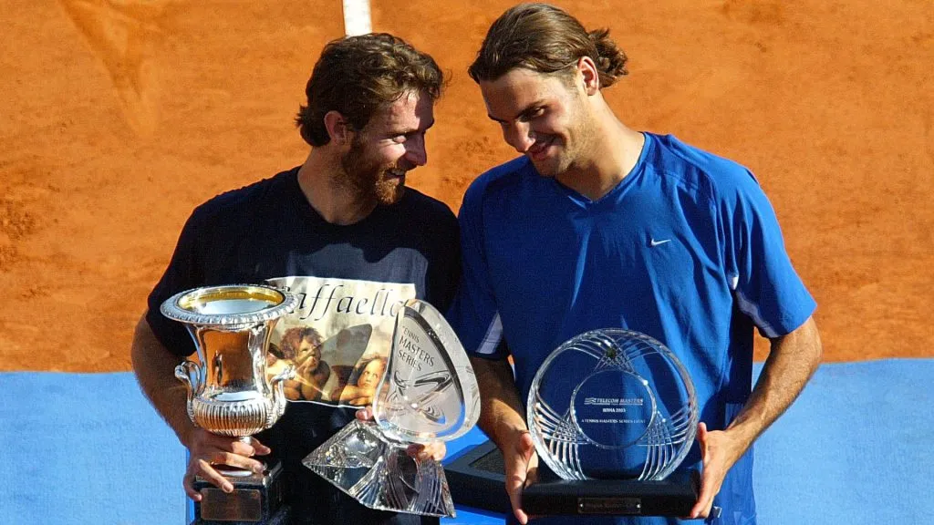 Felix Mantilla of Spain and Roger Federer of Switzerland share the podium after the Final of the ATP Rome Masters. (Mario Pietrangeli/Getty Images)