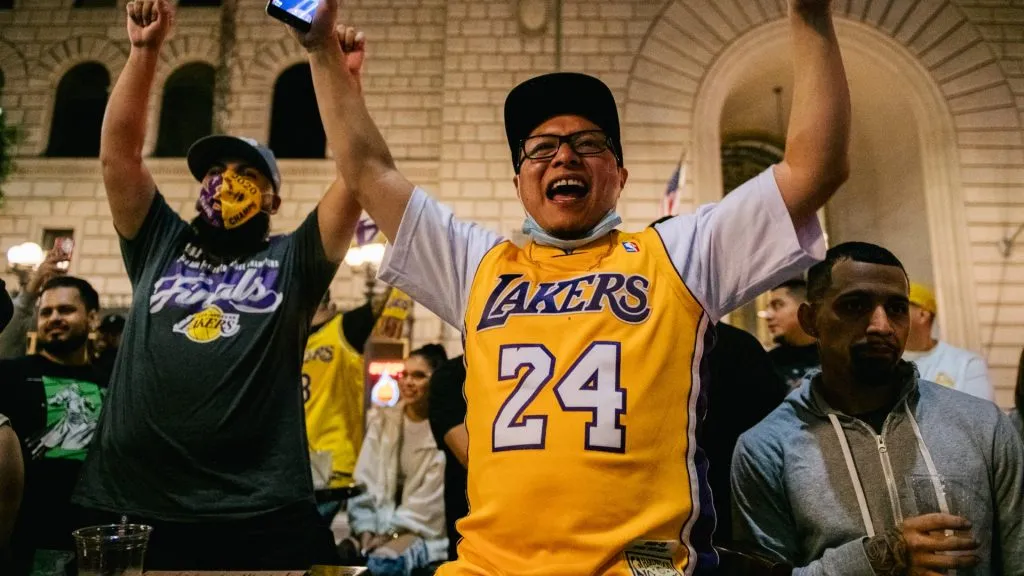 Lakers fans celebrate at an outside bar on October 11, 2020. (Source: Brandon Bell/Getty Images)
