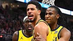 Tyrese Haliburton #0 of the Indiana Pacers celebrates with Pascal Siakam #43 and Aaron Nesmith #23 after making a basket against the Cleveland Cavaliers