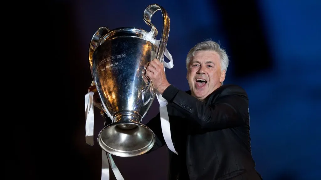 Carlo Ancelotti of Real Madrid CF holds the UEFA Champions League cup celebrating their victory on the UEFA Champions League Final match against Club Atletico de Madrid in 2014. (Source: Gonzalo Arroyo Moreno/Getty Images)