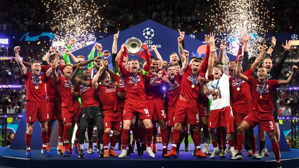 Jordan Henderson of Liverpool lifts the Champions League Trophy after winning the UEFA Champions League Final in 2019. (Source: Michael Regan/Getty Images)