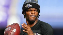 Lamar Jackson #8 of the Baltimore Ravens warms up before a preseason game against the Philadelphia Eagles at M&T Bank Stadium on August 9, 2024 in Baltimore, Maryland.