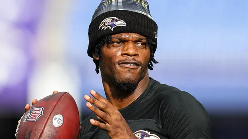 Lamar Jackson #8 of the Baltimore Ravens warms up before a preseason game against the Philadelphia Eagles at M&T Bank Stadium on August 9, 2024 in Baltimore, Maryland.