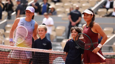 Iga Swiatek and Emma Raducanu pose for a photo ahead of their French Open match