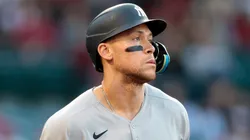 Aaron Judge #99 of the New York Yankees runs to first base after intentionally walked against the Los Angeles Angels in the first inning at Angel Stadium of Anaheim on May 28, 2025 in Anaheim, California.