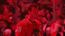 Jonathan Toews #19 of the Chicago Blackhawks stands for the National Anthem prior to a game against the Philadelphia Flyers at United Center on April 13, 2023 in Chicago, Illinois.