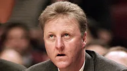 Head coach Larry Bird of the Indiana Pacers sits on the bench as he looks on during the game against the Chicago Bulls at the United Center on April 7, 1999 in Chicago, Illinois.