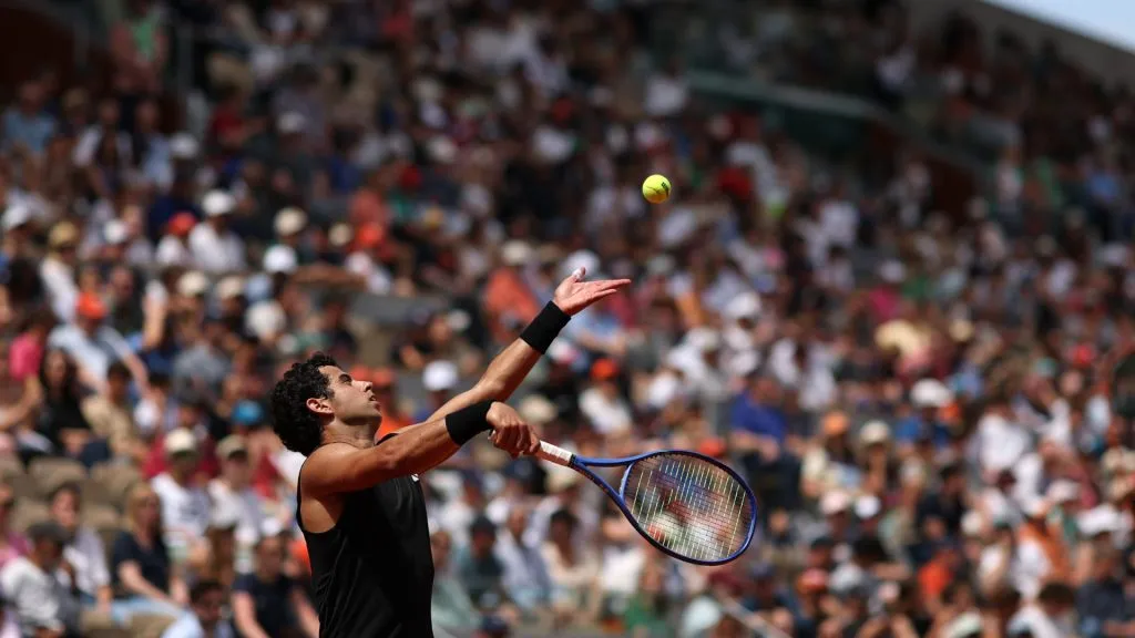 Jaume Munar of Spain serves against Arthur Fils of France during the second round of Roland Garros. (Clive Brunskill/Getty Images)